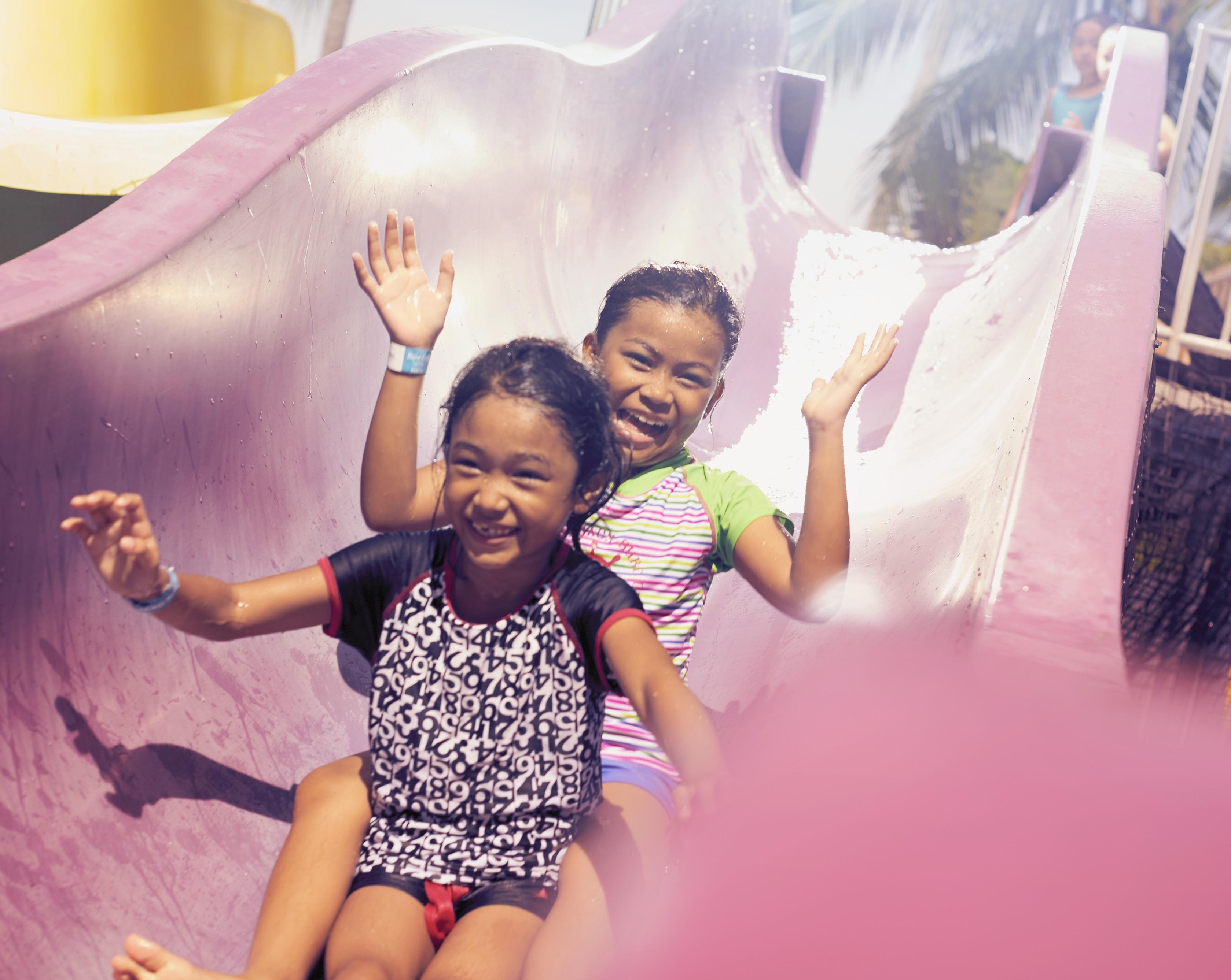 Hard Rock Hotel Penang Batu Feringgi Exterior foto Two children on a slide
